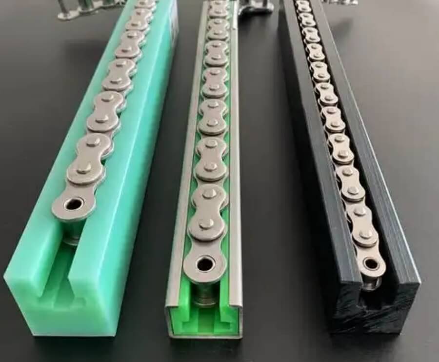 Green and black UHMW Chain Guides for heavy-duty industrial chains