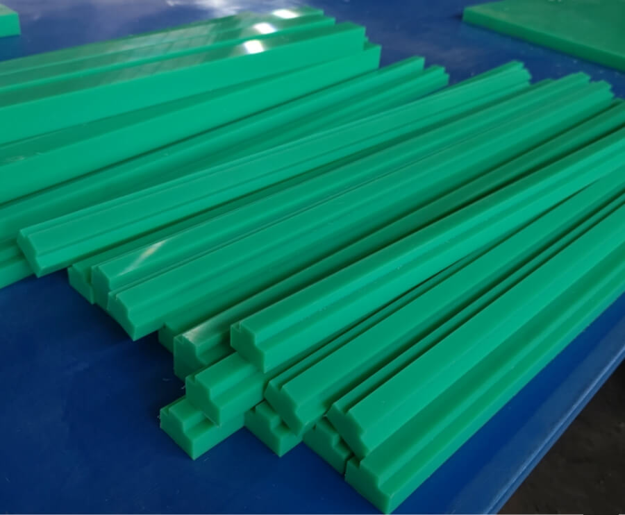 Green UHMW Chain Guides for conveyor and packaging lines