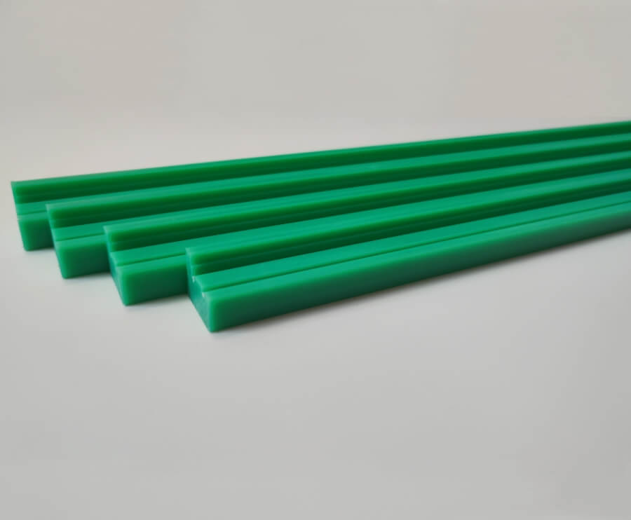 Green UHMW Chain Guides with custom machining