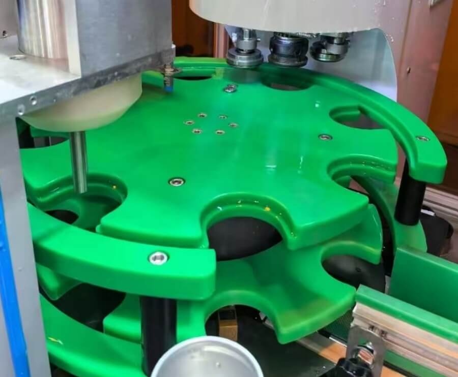 UHMWPE star wheel and guide used in beverage production line